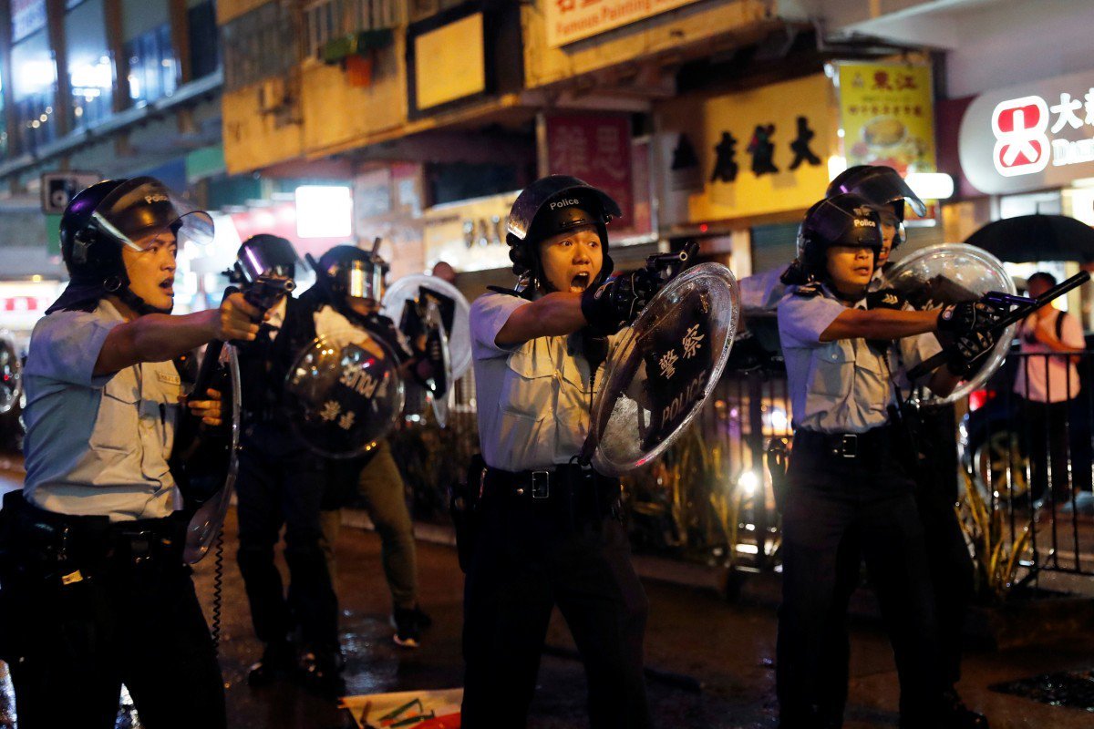 Shot fired and water cannon used for first time on Hong Kong protesters