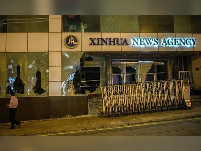 Hong Kong protesters firebomb Xinhua News Agency