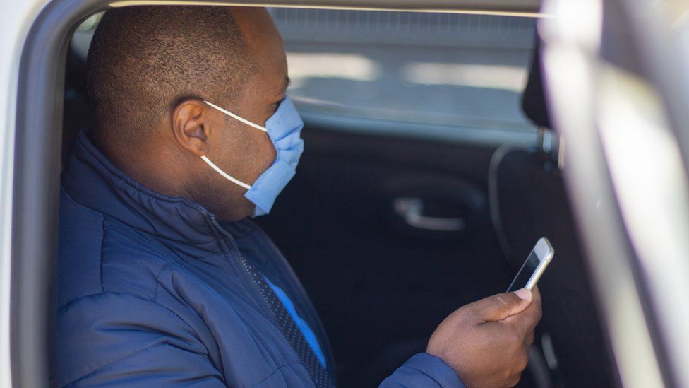 Uber will continue to require riders to wear masks