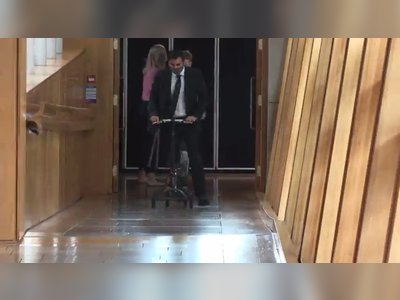 Scottish health minister hits back at BBC editor after VIDEO showing him fall off a scooter goes viral