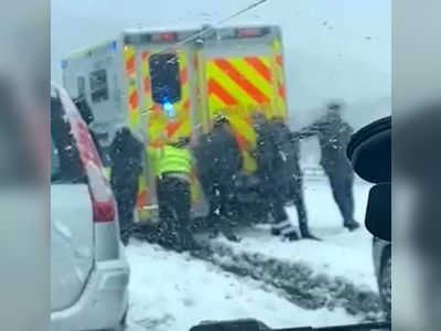 Drivers rescue ambulance stuck in snow on 999 call